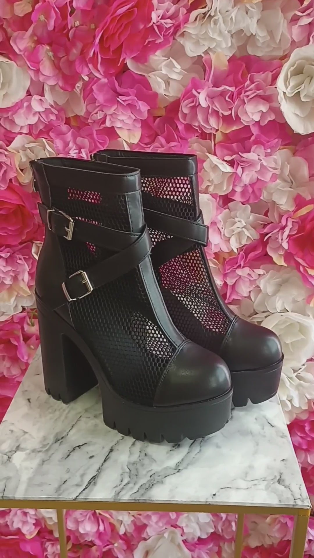 Modern platform women's boots feature a fischnet design for a chic and sexy look. With decorative buckle. Shoes Xenia 