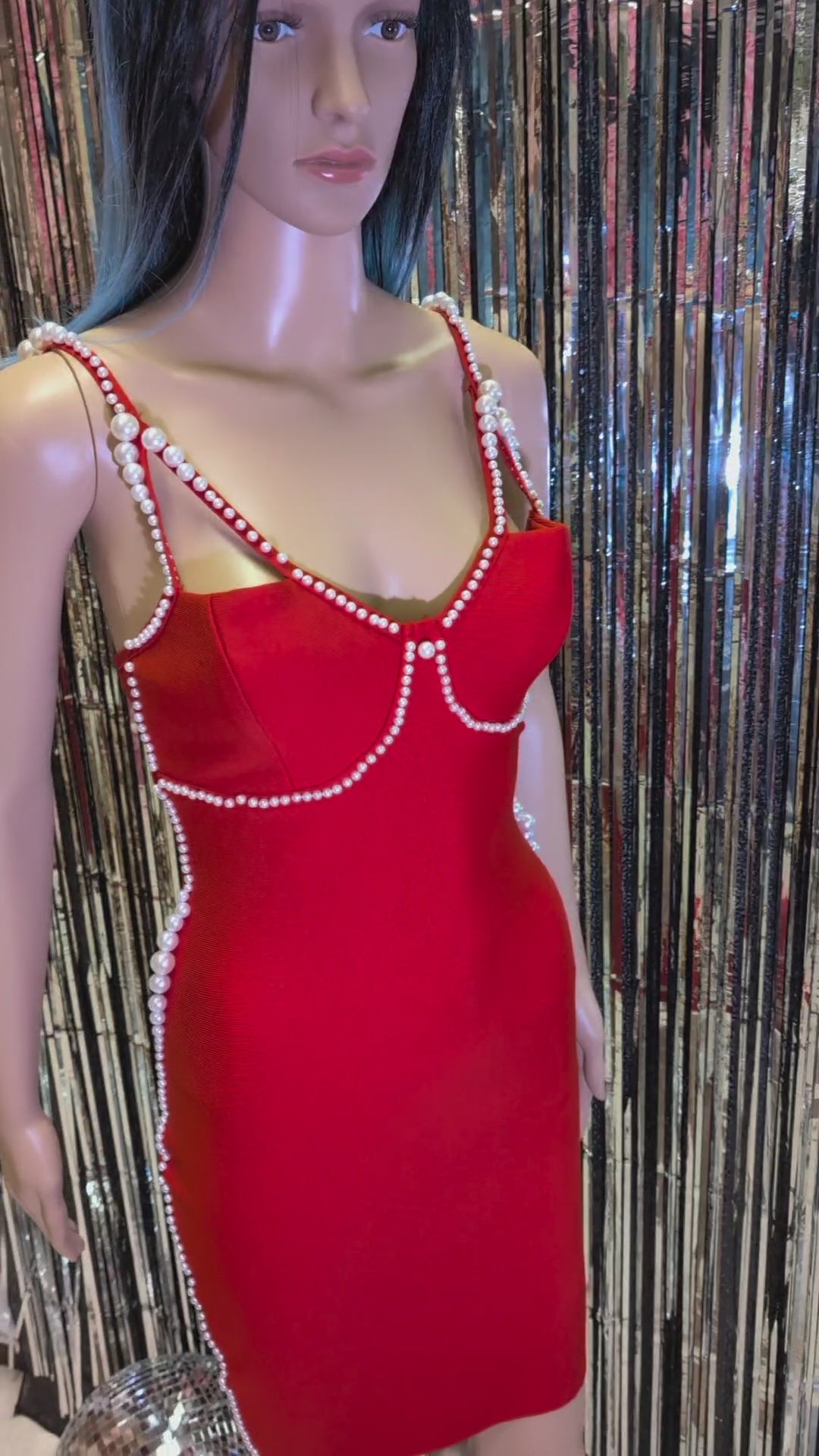 Gorgeous red dress Scarlett designed with a white pearls. The bandage style ensures a figure-hugging fit, making it the perfect choice for a special occasion.